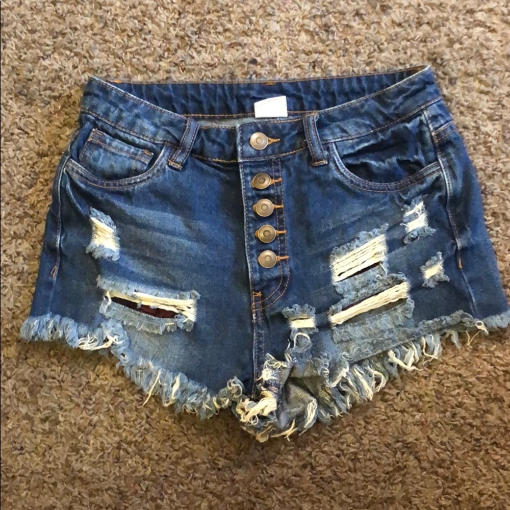 High waisted distressed jean shorts